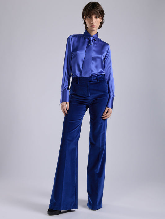 Blue velvet flare trousers