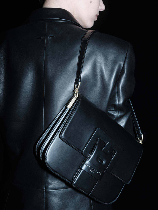 Black leather TOUCH Me bag