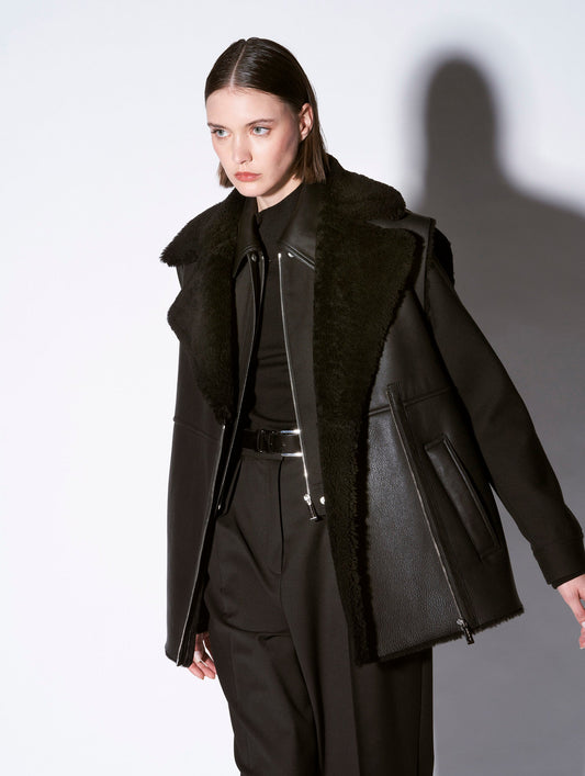 Sleeveless black shearling jacket