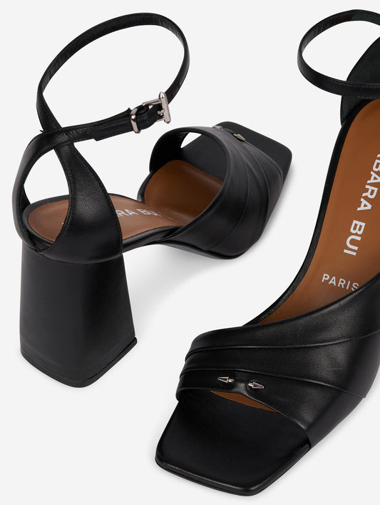 Asymmetrical black leather sandals
