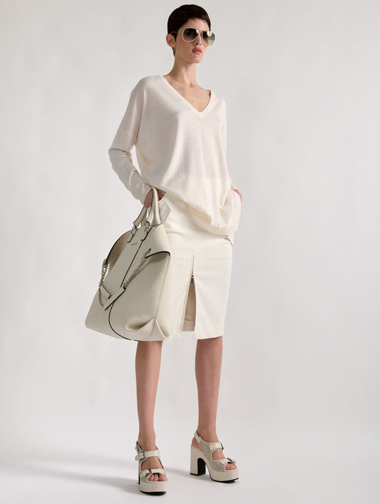 Oversized reversible sweater in ivory knit