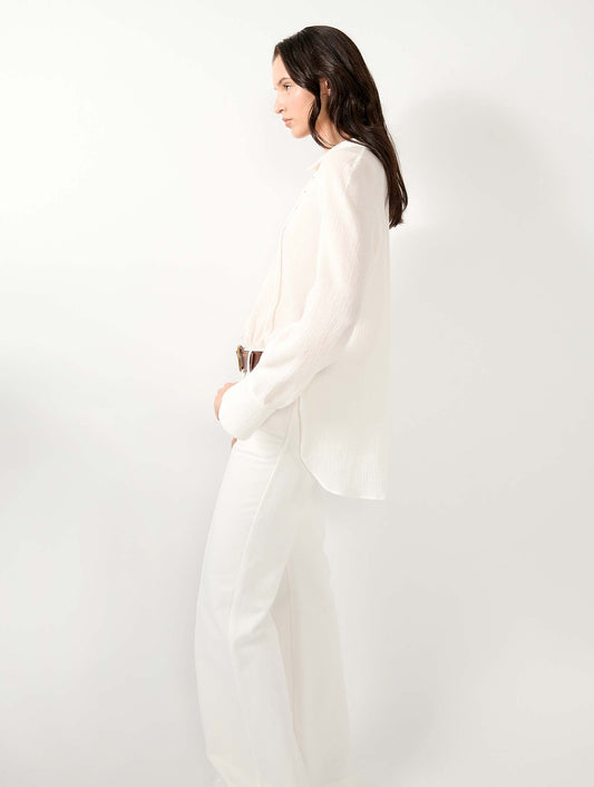 White crepon blouse with laced neckline
