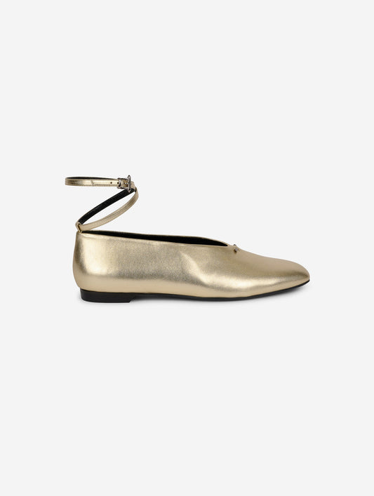 Gold leather ankle strap ballet flats