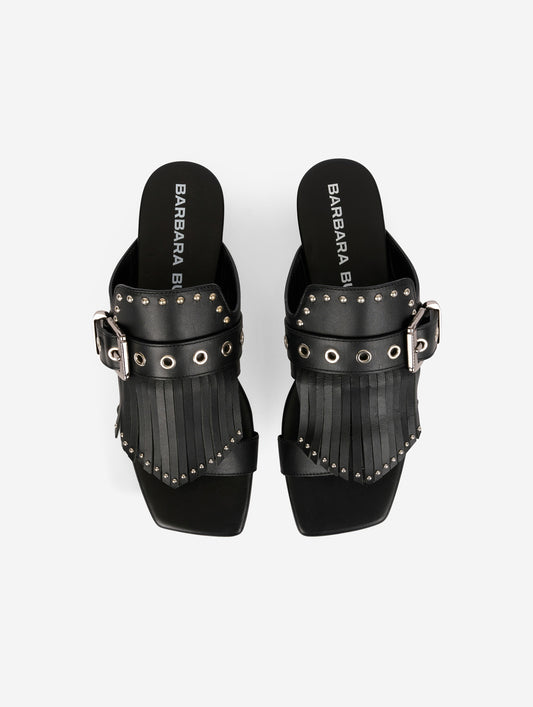 Black leather fringed and studded mules