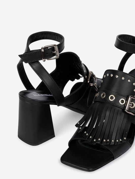Black leather fringed and studded sandals