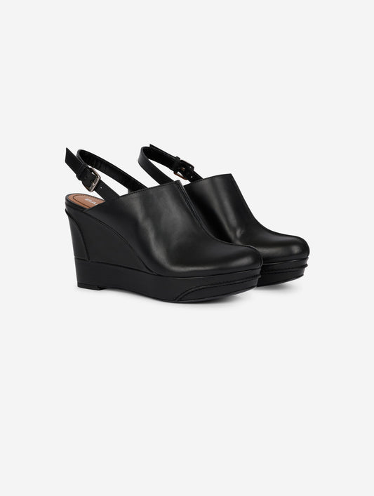 Black leather wedge clogs