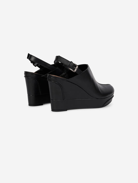 Black leather wedge clogs