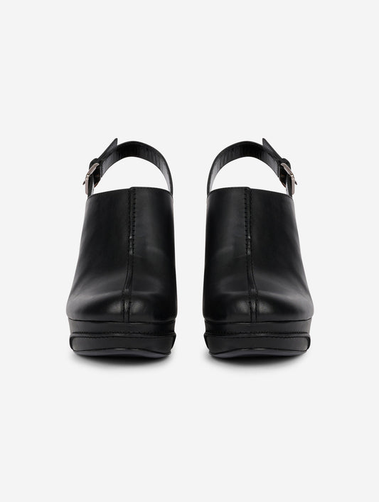 Black leather wedge clogs