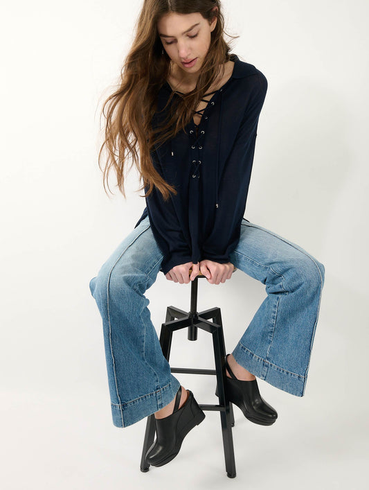 Black leather wedge clogs