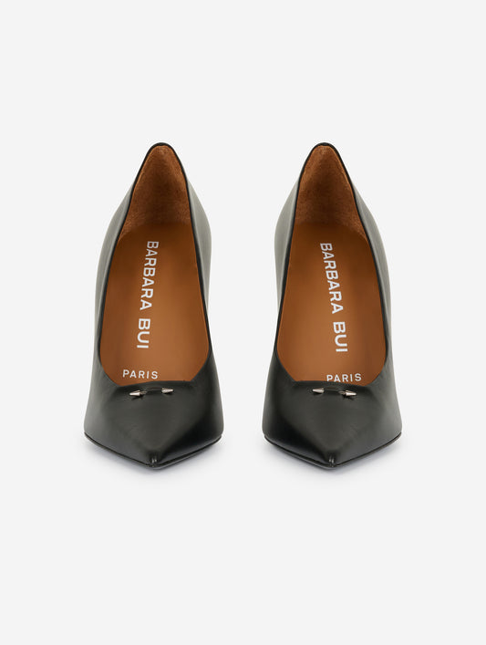 Black leather pumps