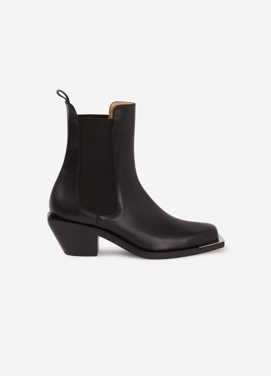 "Cut" black leather boots